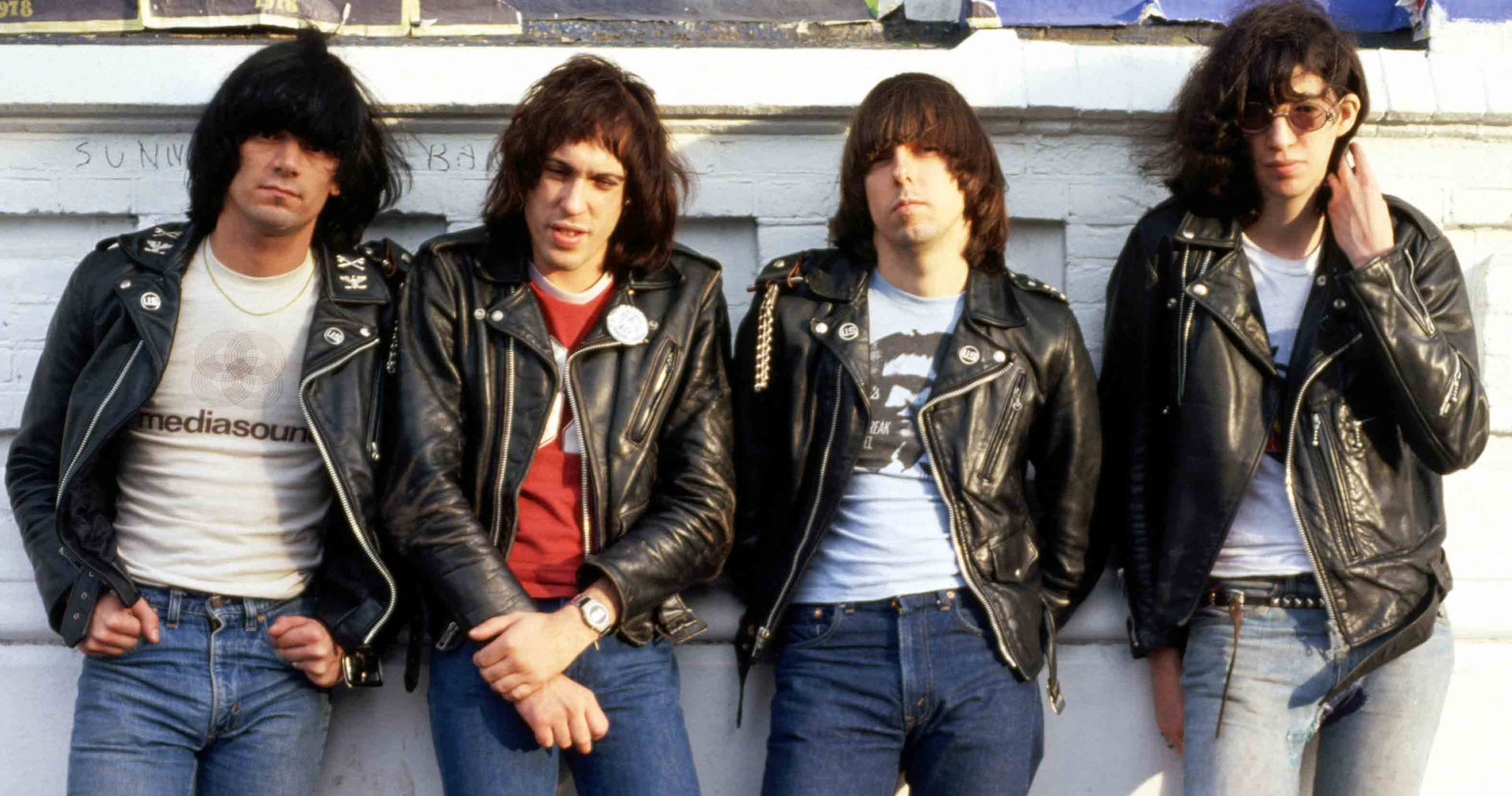 Iconic Ramones Band During A 1974 Photoshoot Background