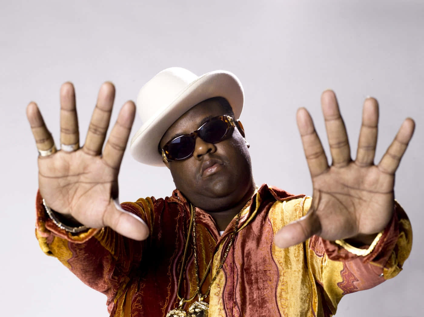 Iconic_ Rapper_in_ White_ Hat_and_ Sunglasses Background