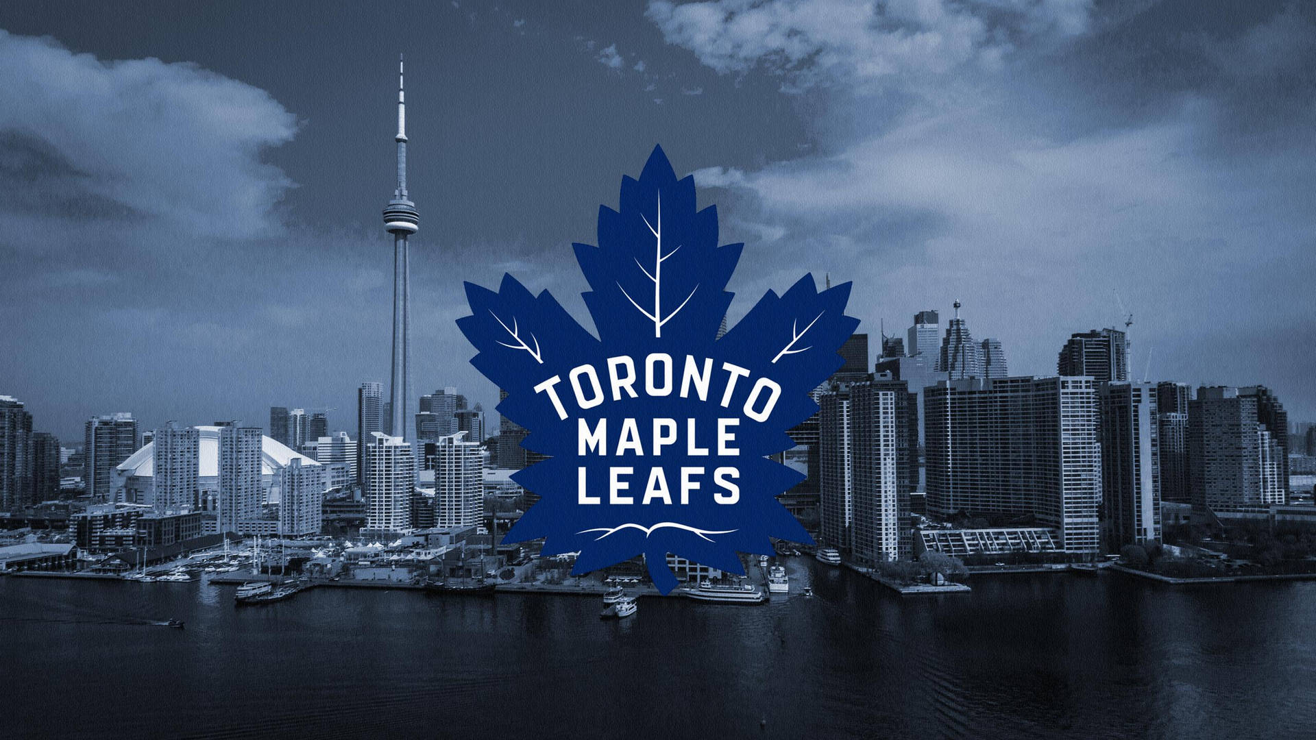 Iconic Toronto Maple Leafs Logo With Lakeside Buildings As Backdrop Background