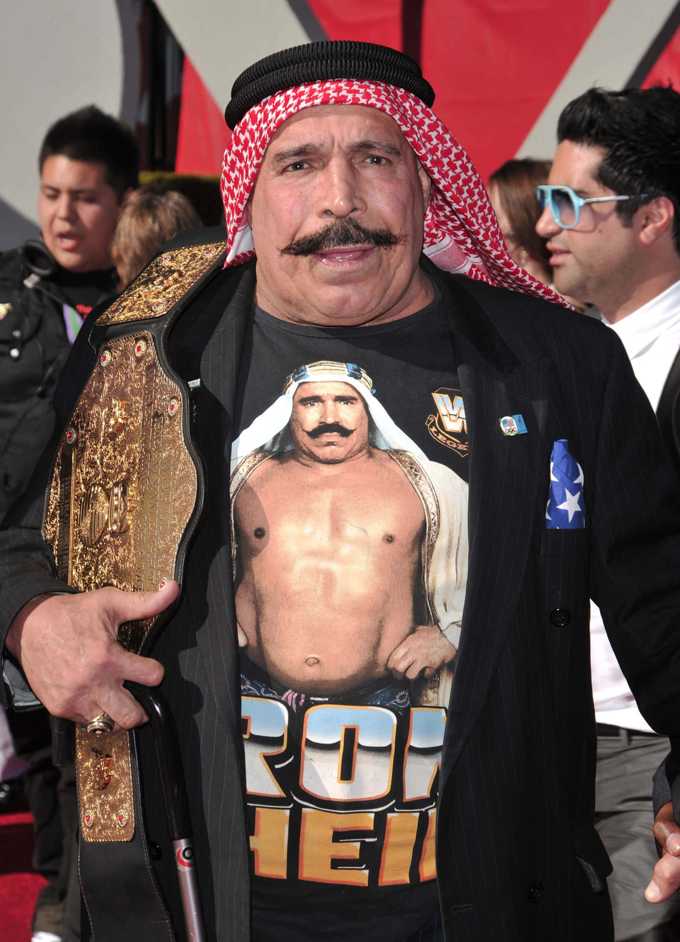 Iconic Wrestling Champion, The Iron Sheik Gazing Intensely+ Background