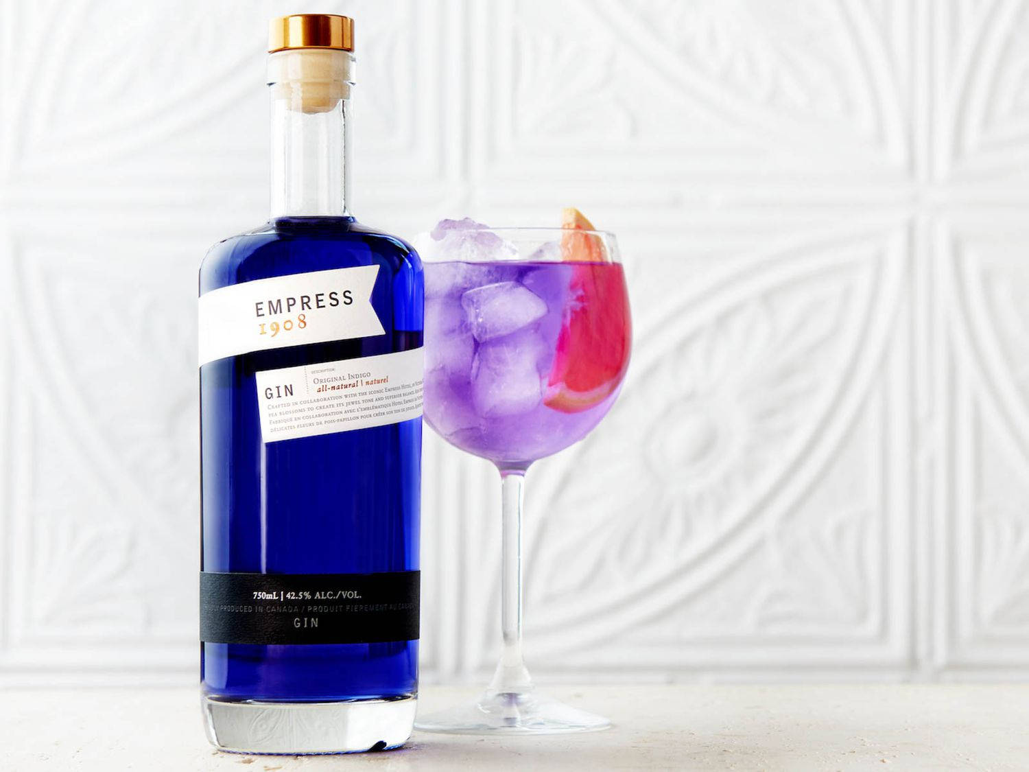 Icy Grapefruit Empress 1908 Gin Elixir Background