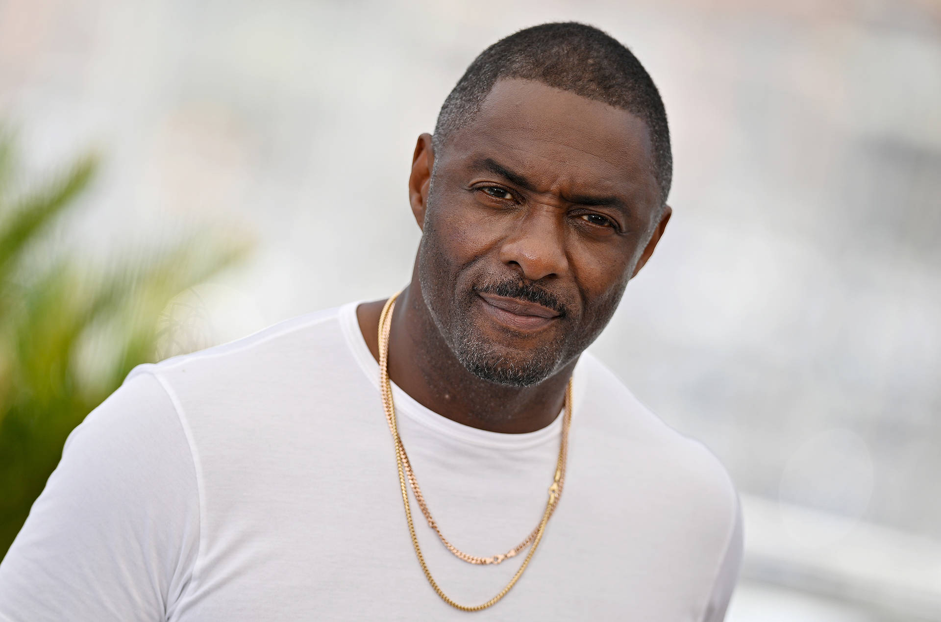 Idris Elba With White Shirt And Gold Necklaces