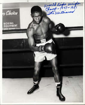 Ike Williams During A Championship Boxing Match Background