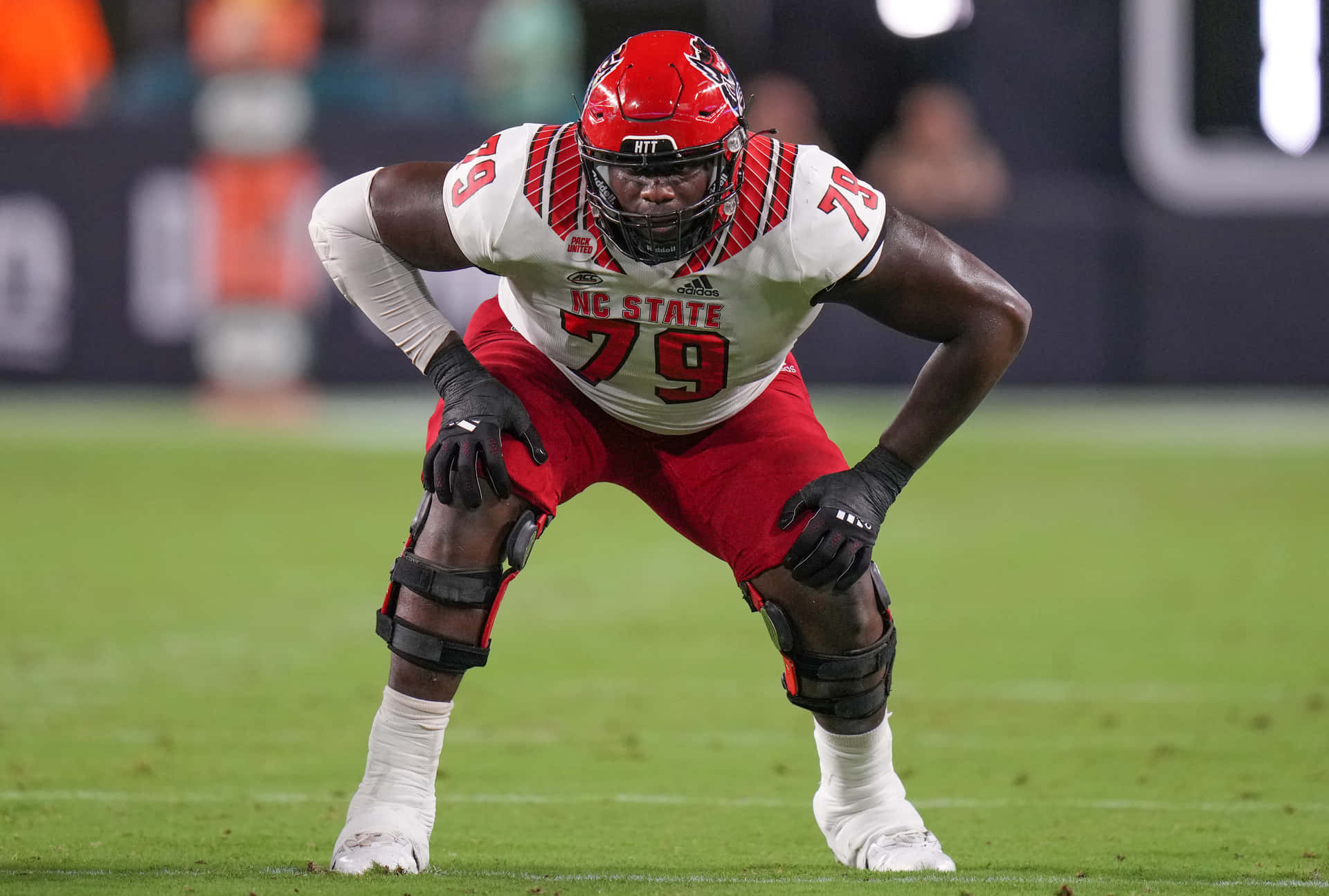 Ikem Ekwonu Football Player Stance Background
