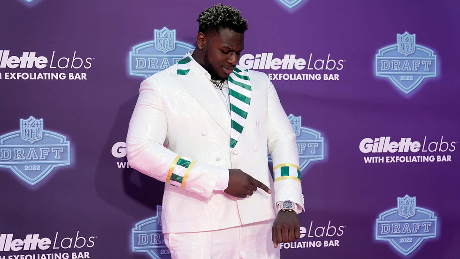 Ikem Ekwonu In Fancy White Suit Background