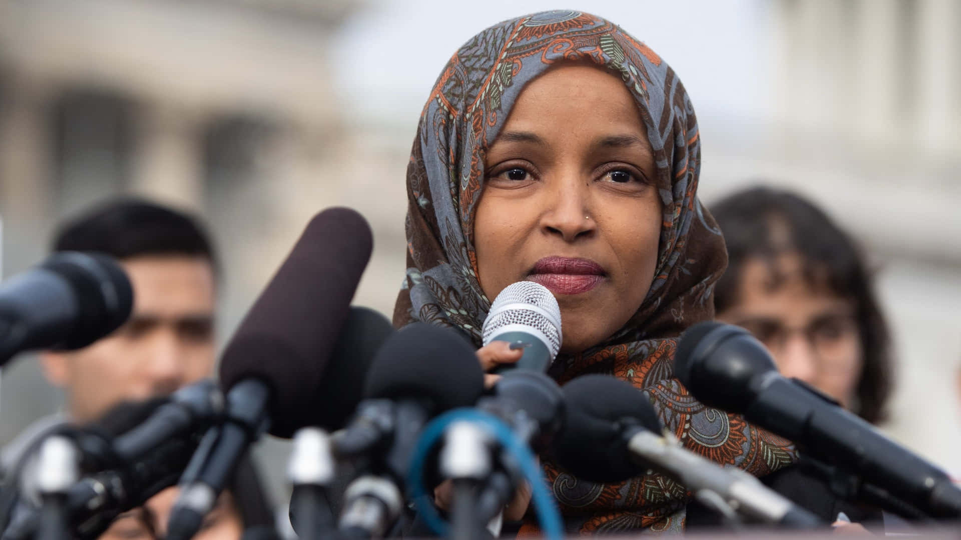 Ilhan Omar Bombarded By Journalists Background