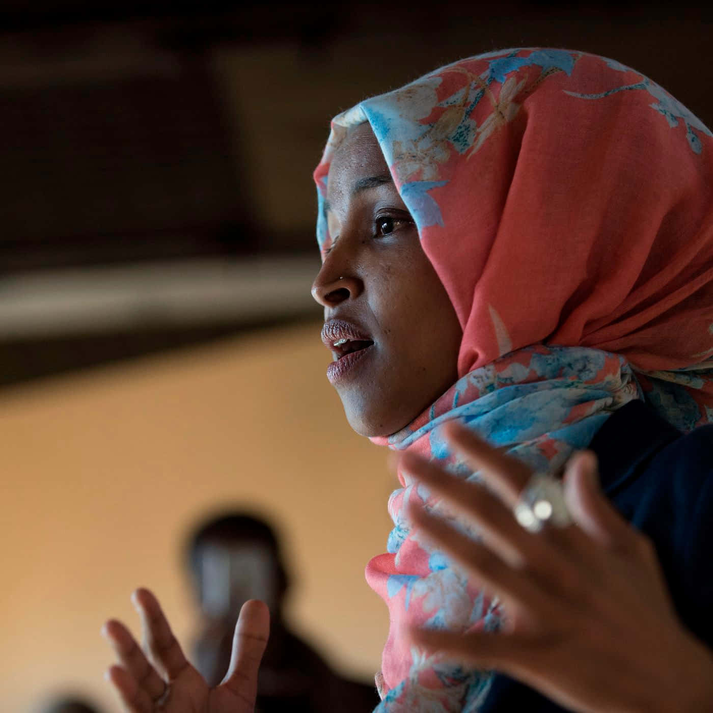 Ilhan Omar, Congresswoman, In A Moment Of Prayer Background