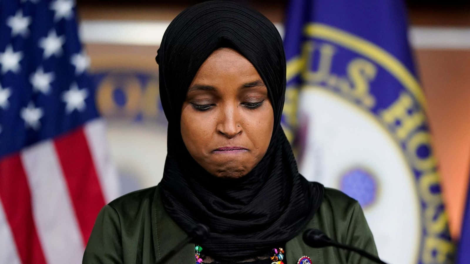 Ilhan Omar Looking Down Background