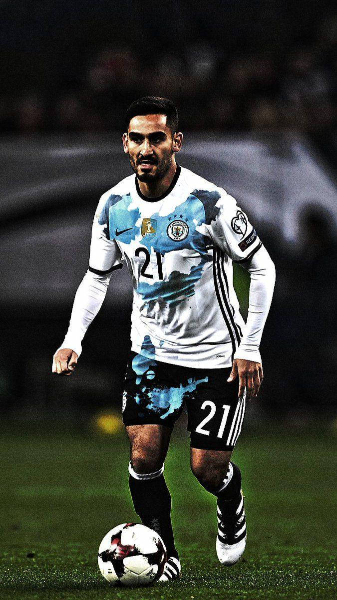 Ilkay Gundogan In Action Full Body Background