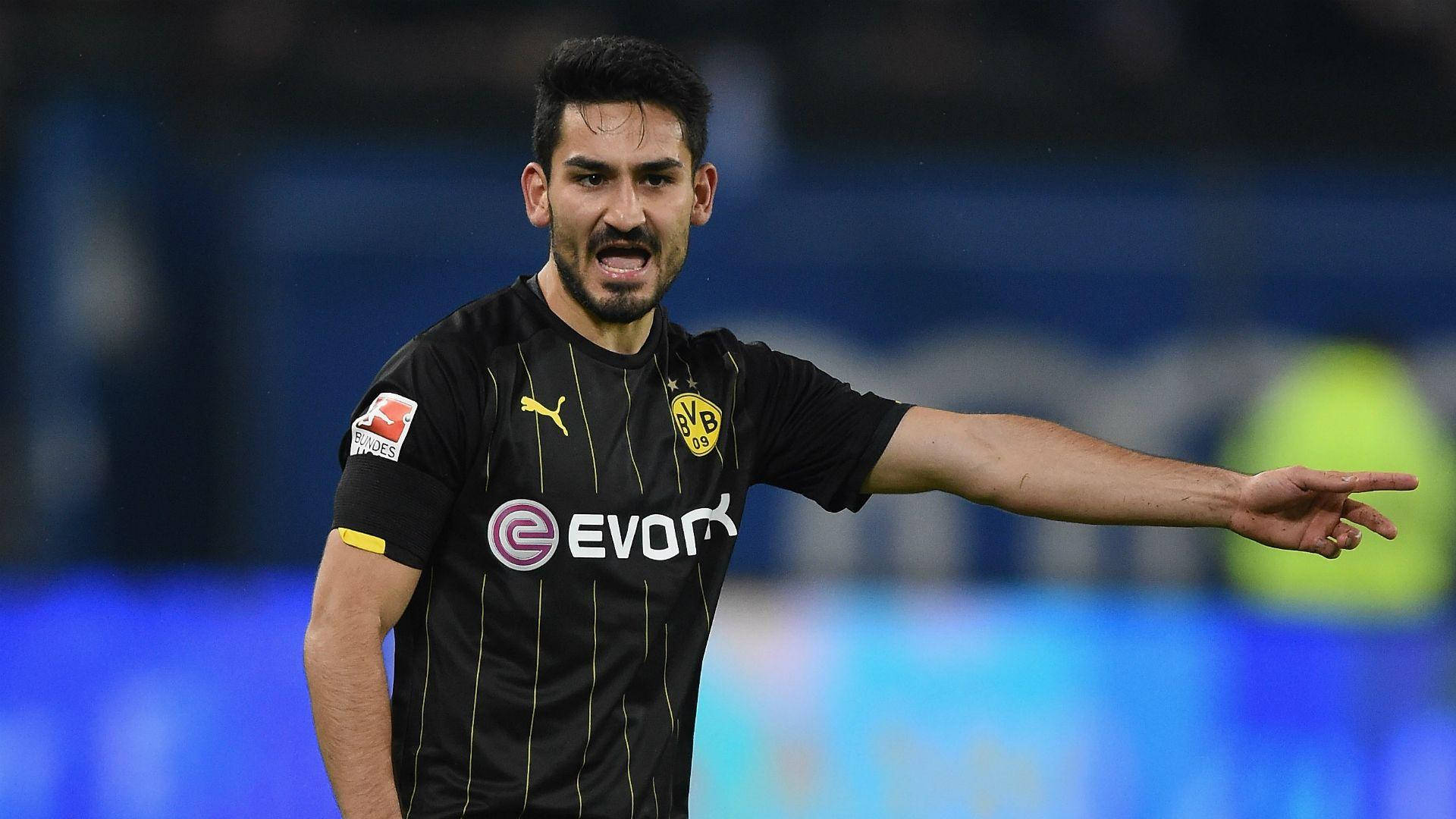 Ilkay Gundogan In Black Shirt Background