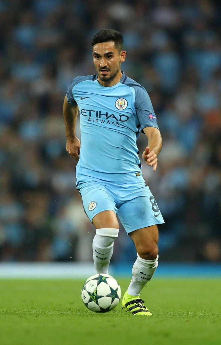 Ilkay Gundogan Kicking A Ball Background