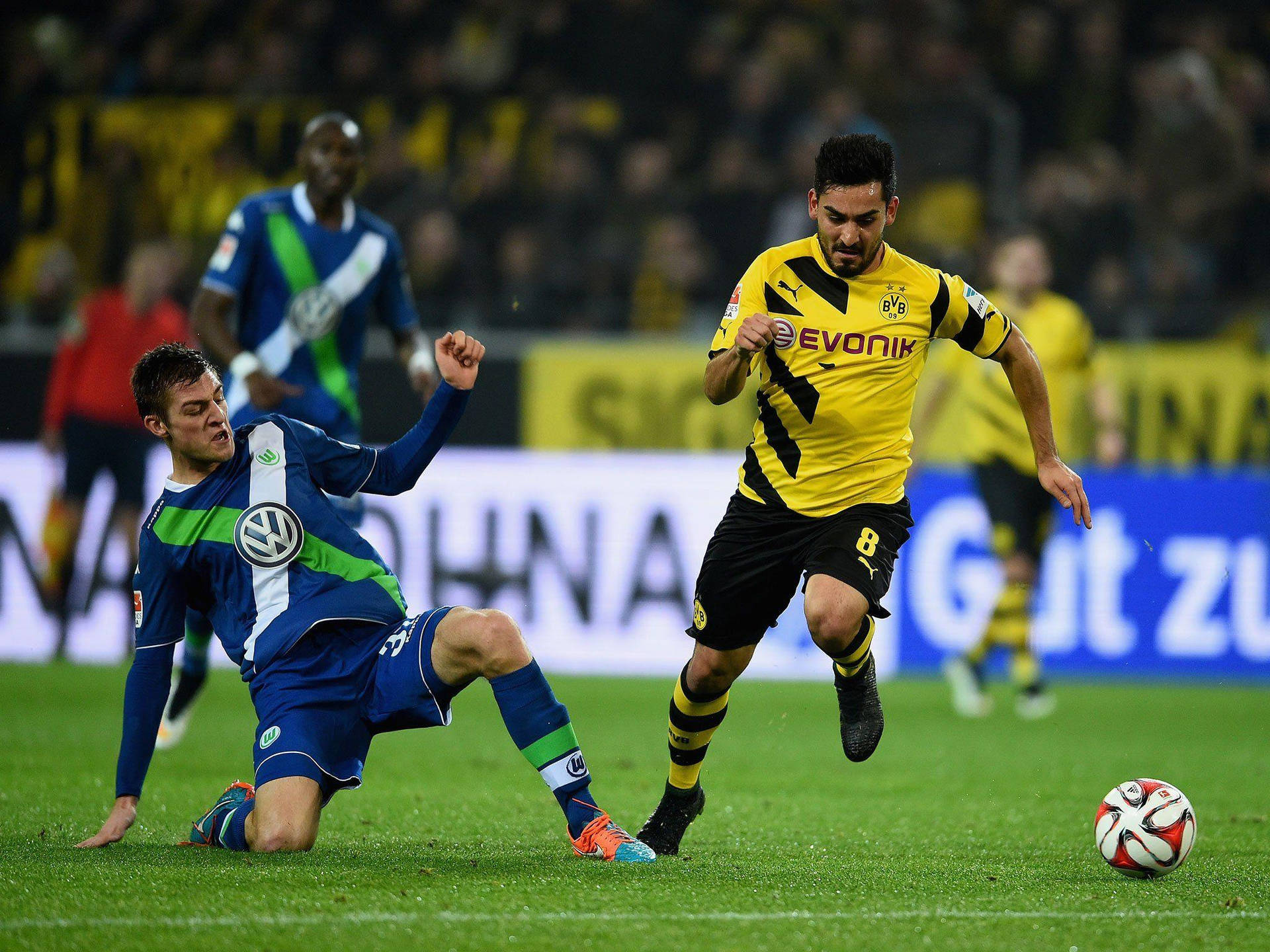 Ilkay Gundogan Versus An Opponent Background