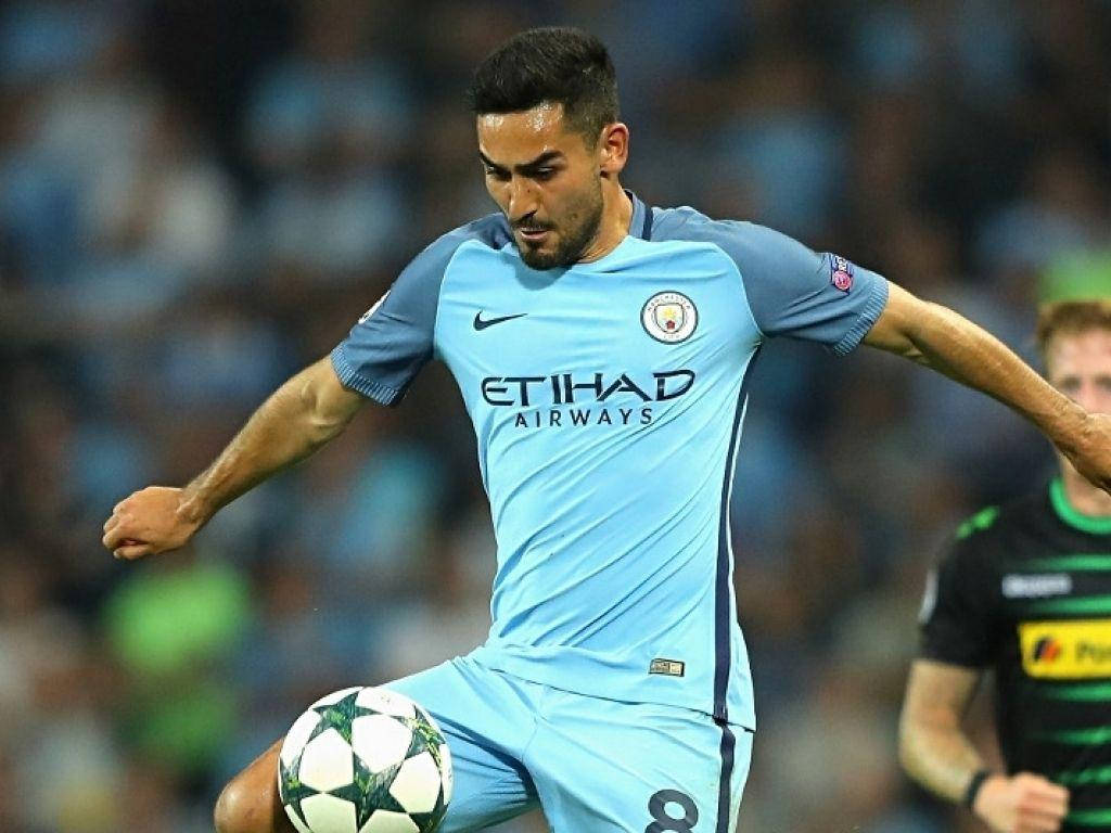 Ilkay Gundogan Wearing Blue Jersey Background