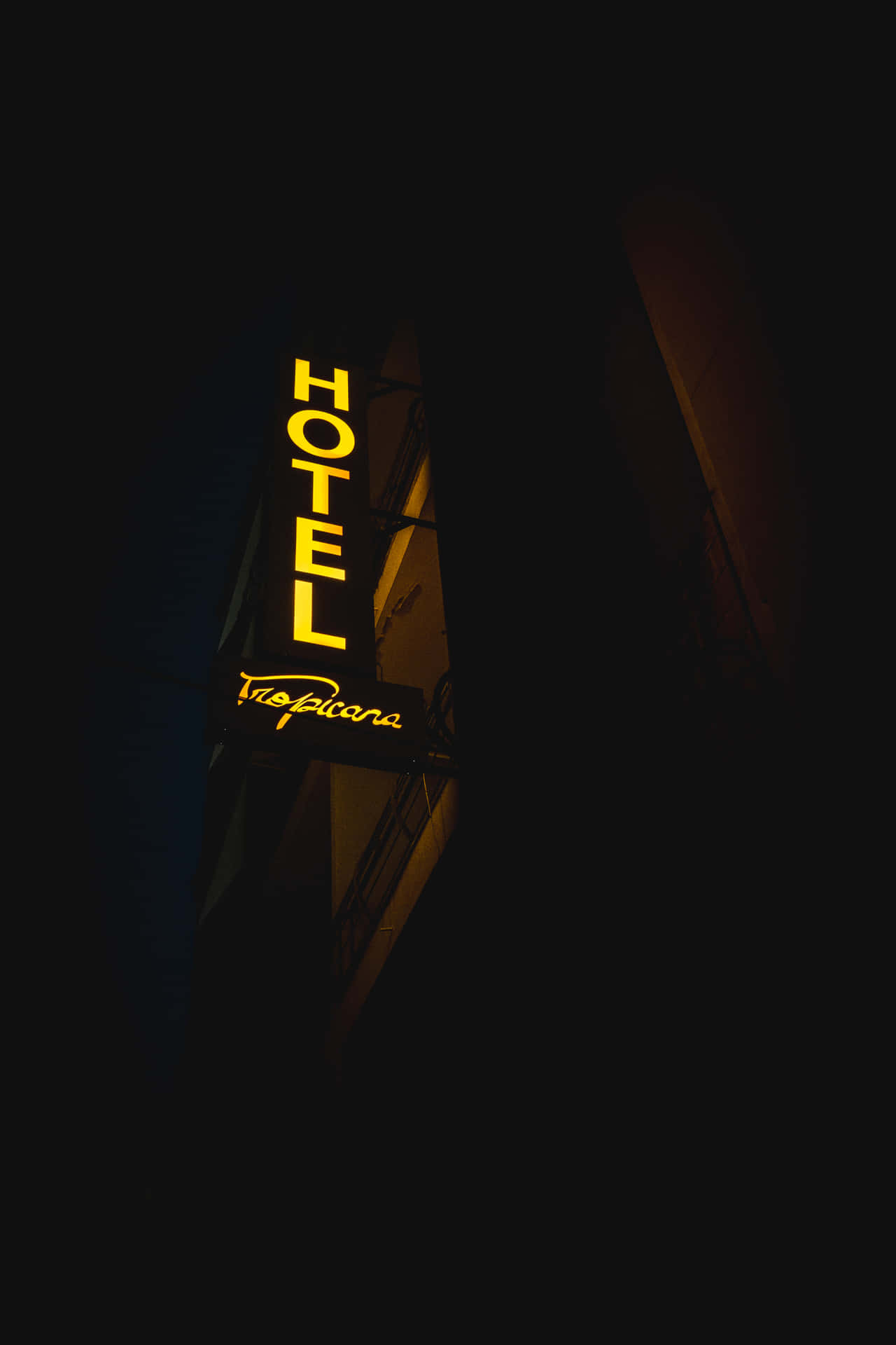 Illuminate The Night With Bright Yellow Neon Lights Background