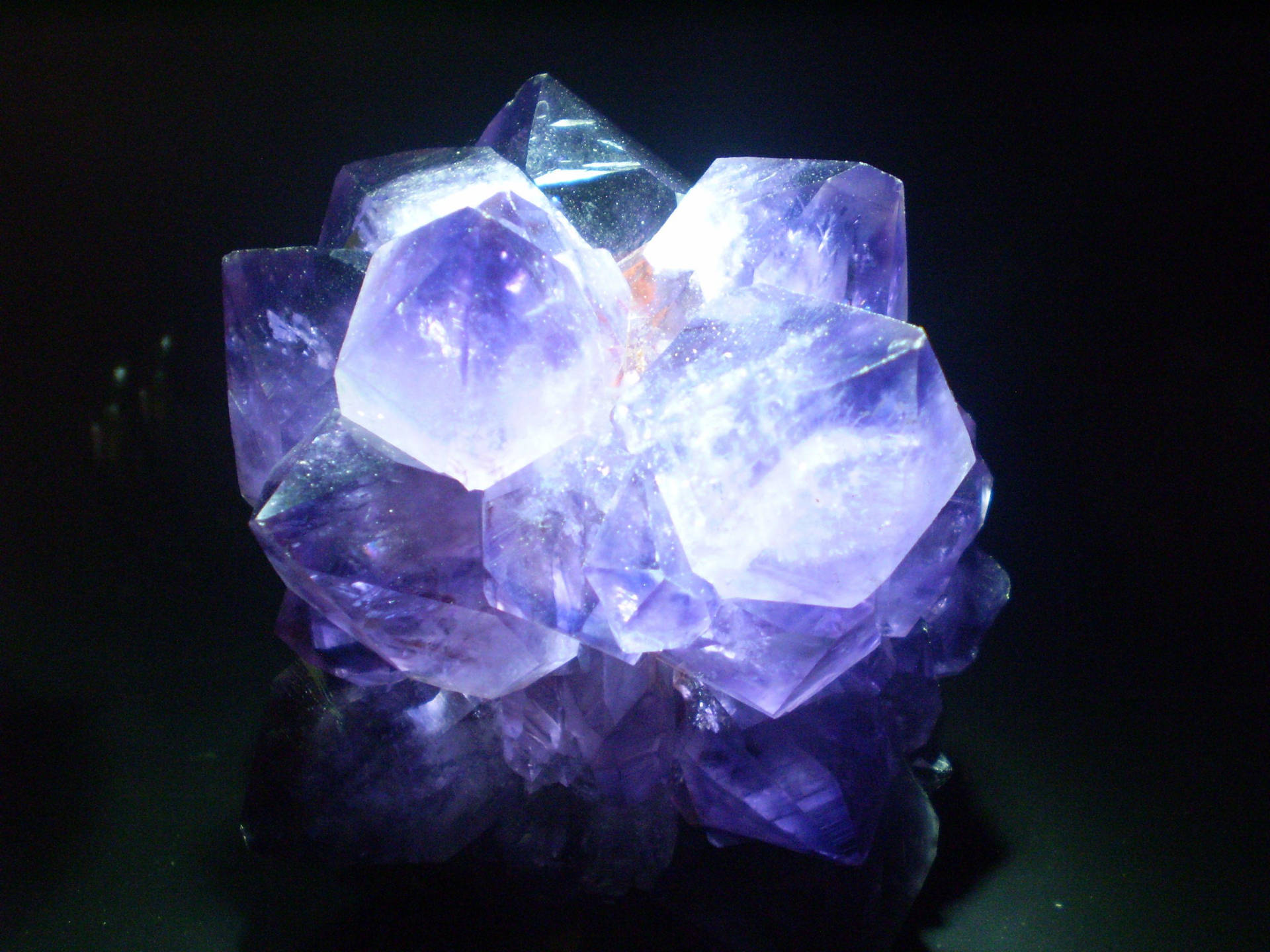 Illuminated Amethyst Crystal Background