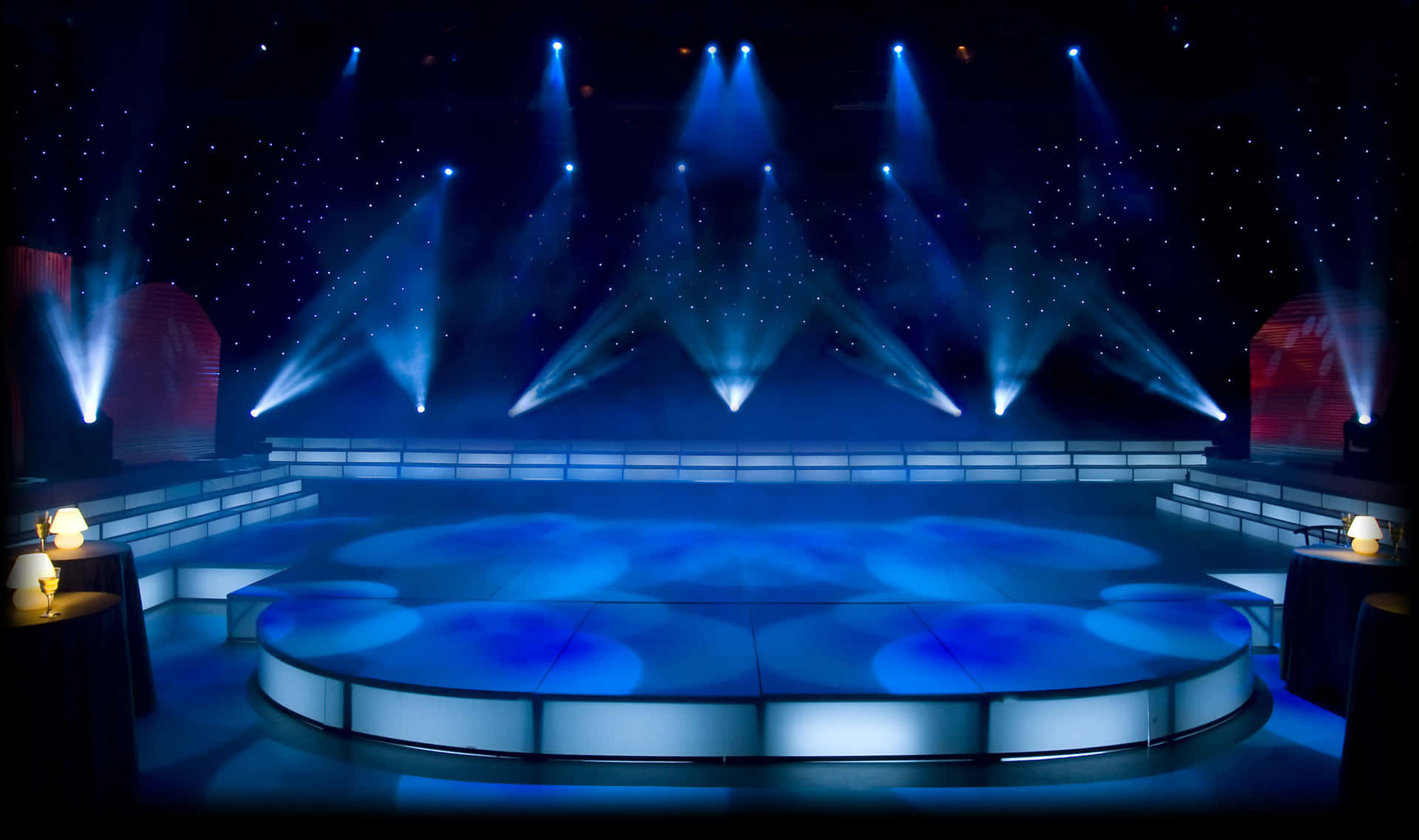 Illuminated Blue Concert Stage Design Background