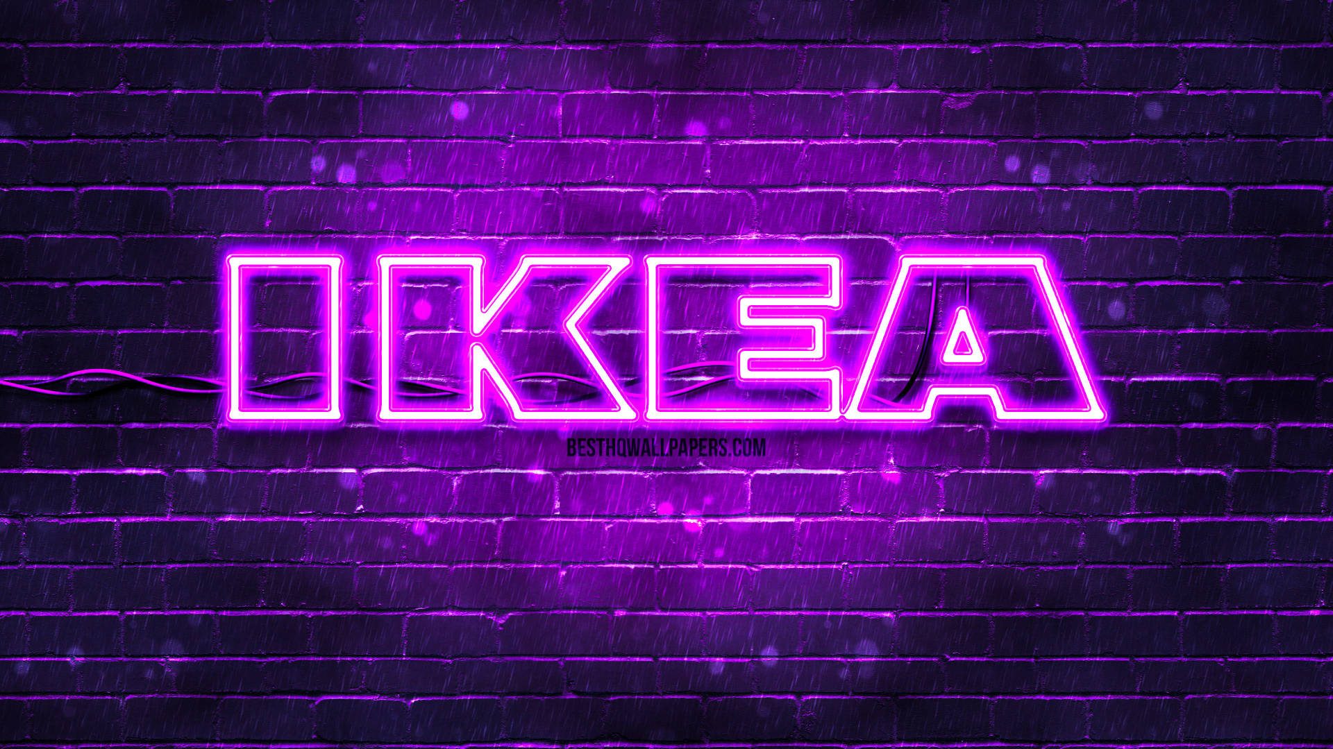 Illuminated Ikea Logo Against Brick Wall Backdrop