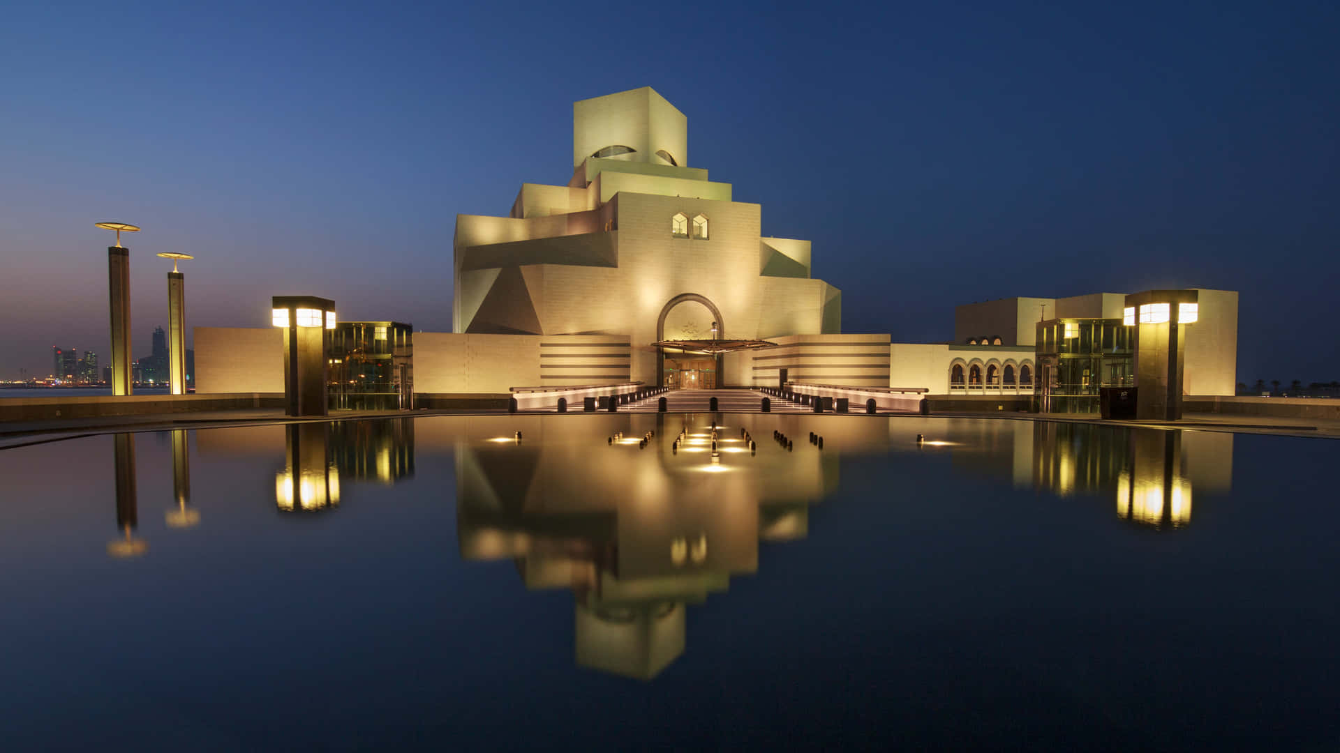 Illuminated Museum Of Islamic Art At Night Background