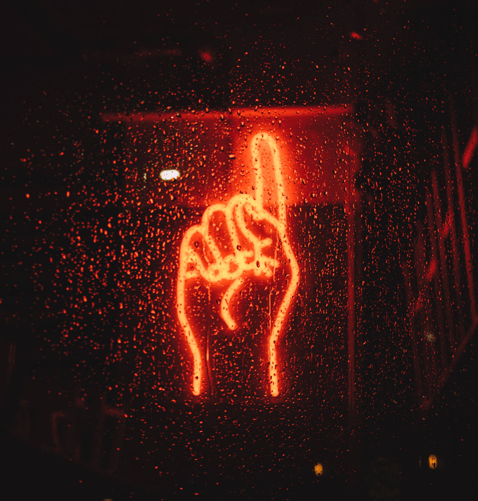 Illuminated Neon Sign Of An Index Finger Pointing Upwards Background