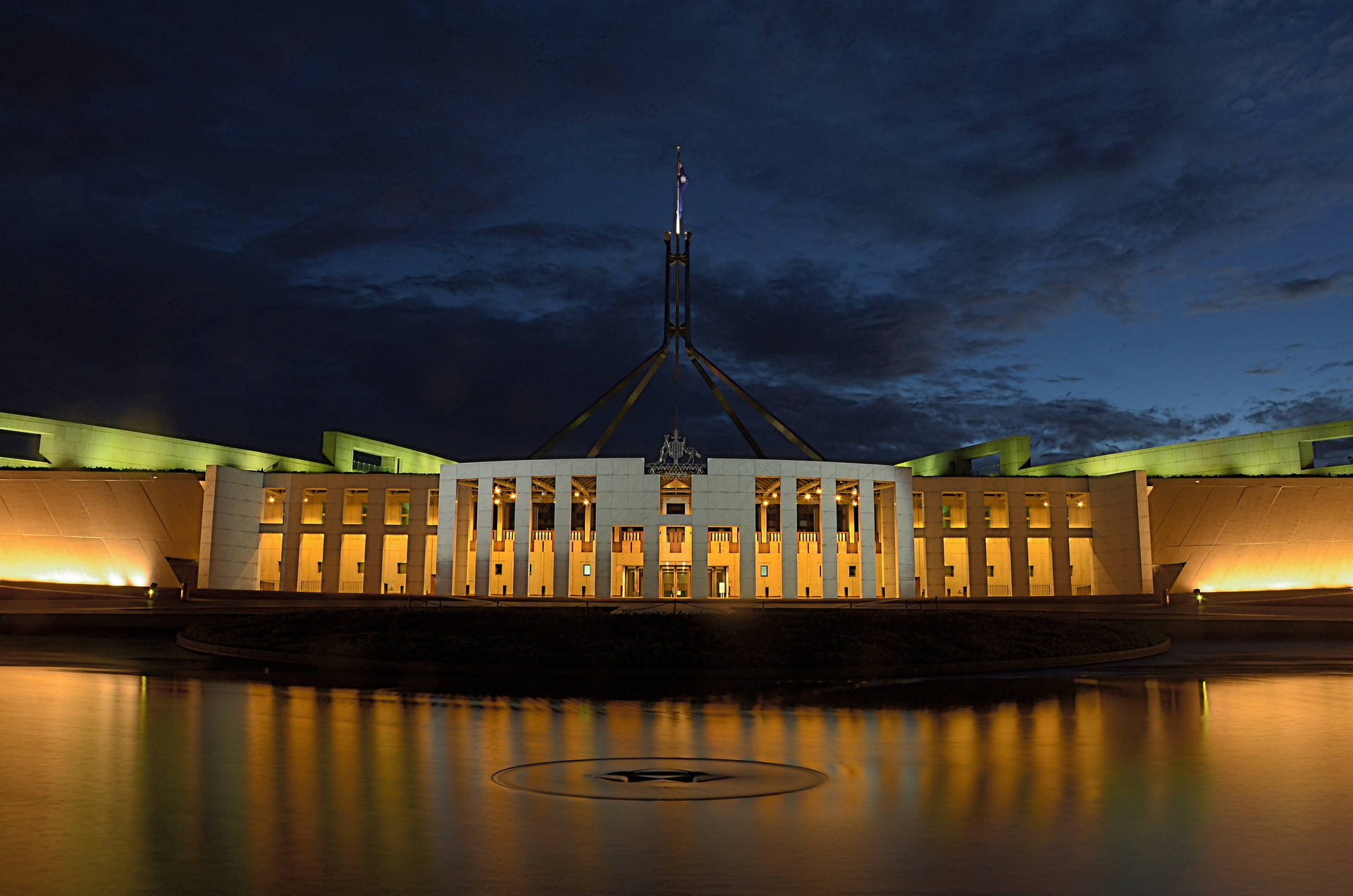 Illuminated Parliament House In Canberra At Night