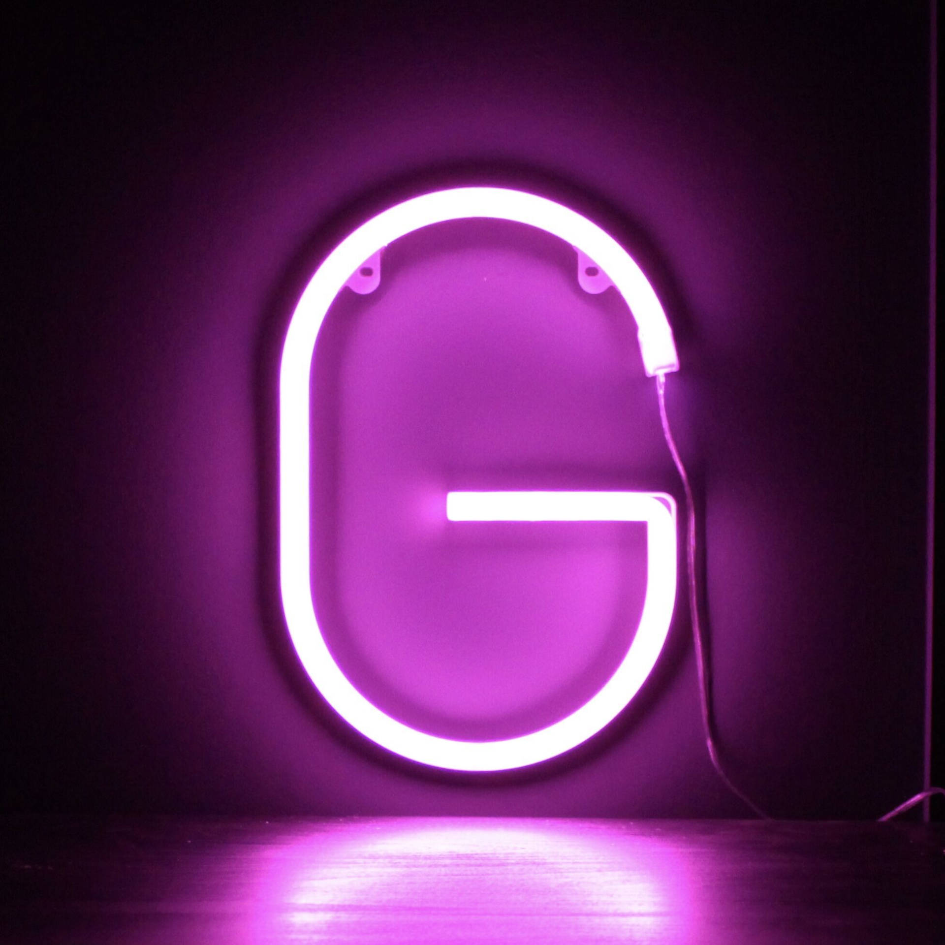 Illuminated Purple Neon Letter G Background
