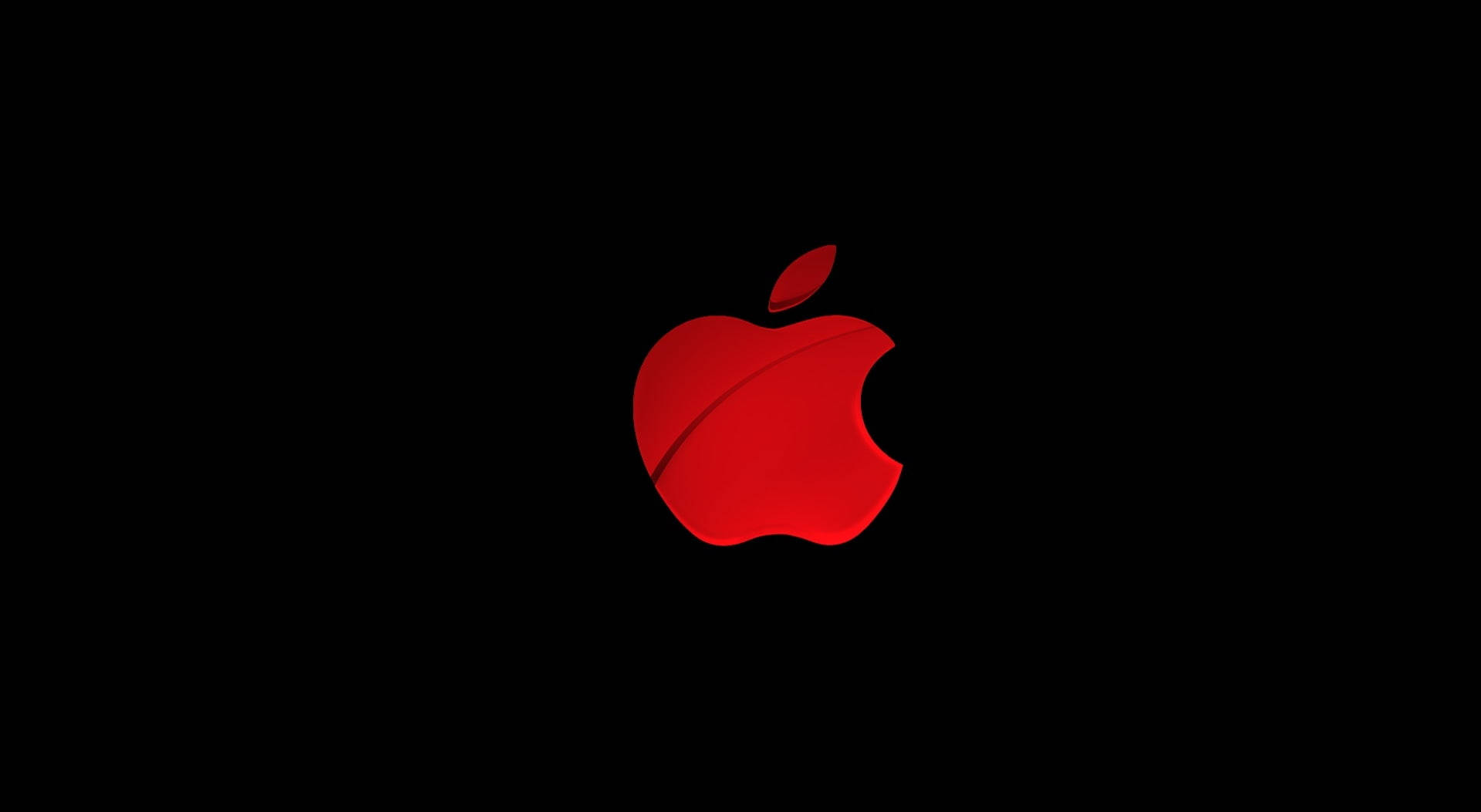 Illuminated Red Apple Logo On A Sleek Black Background Background