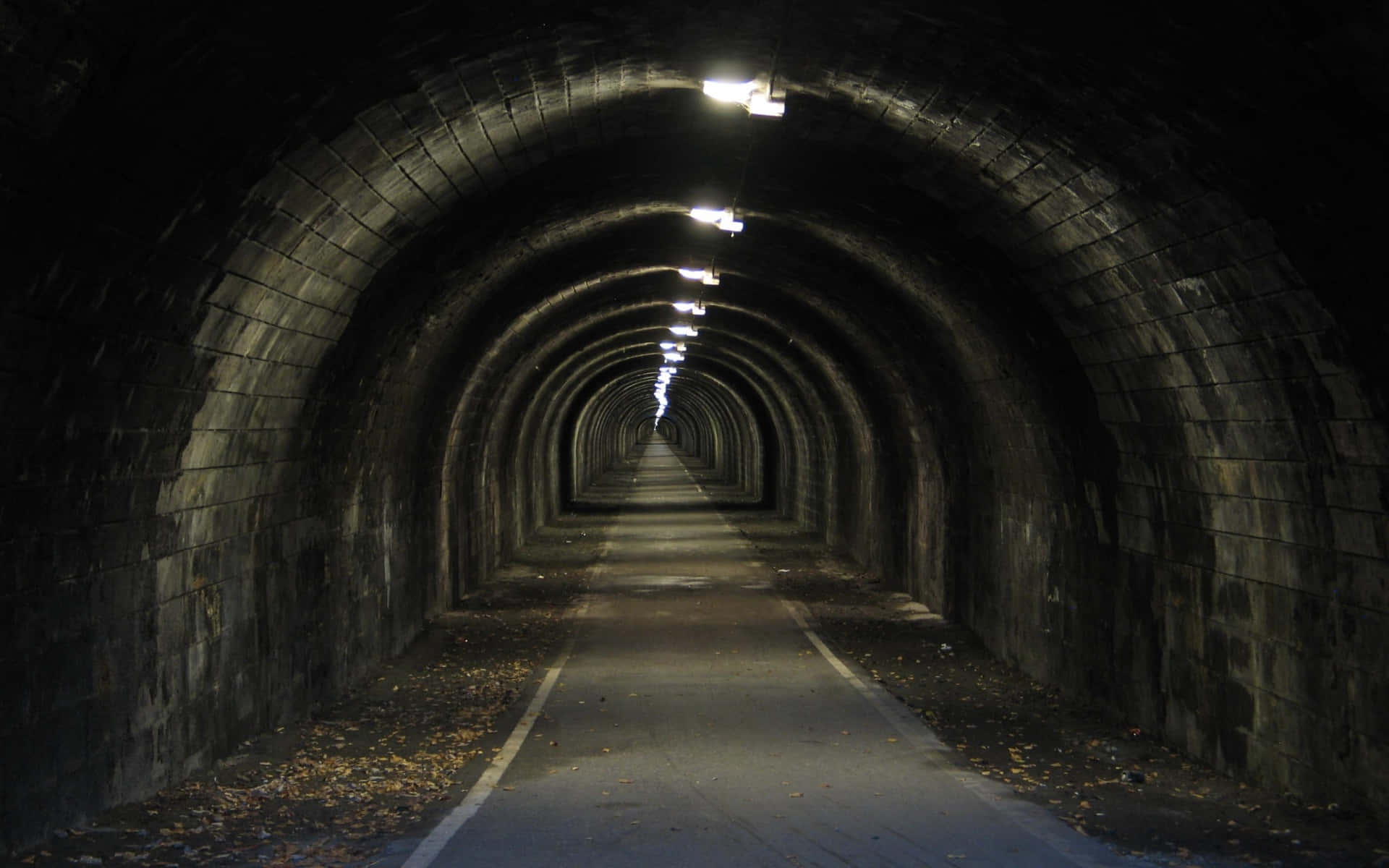 Illuminated Stone Tunnel Perspective.jpg Background