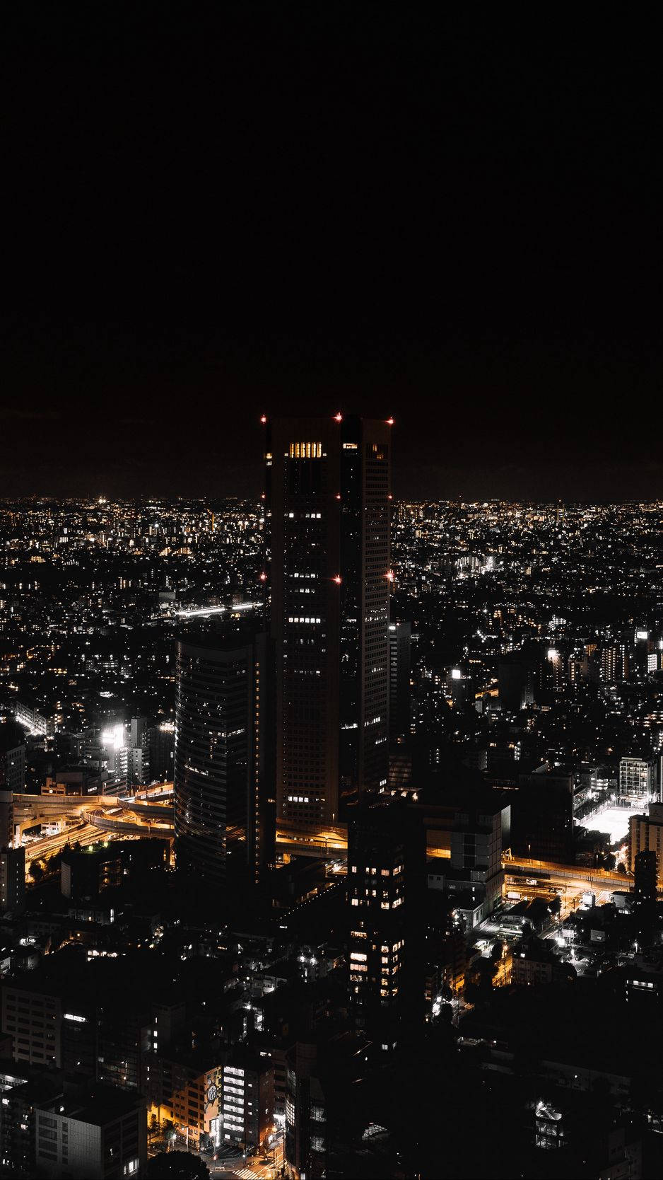 Illuminated Streets Of Night City Offer Inspiring Views Background