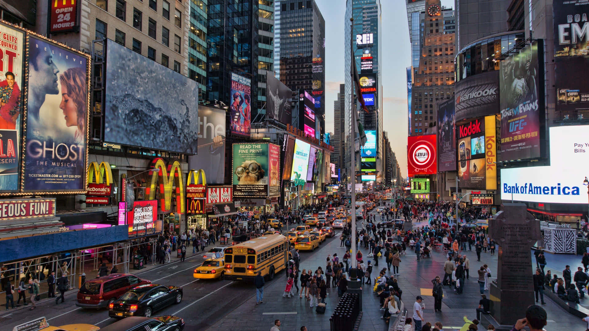 Illuminated Times Square In New York City Background