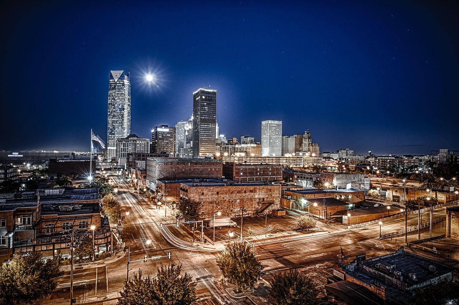 Illuminating Iconic Oklahoma Cityscape Background