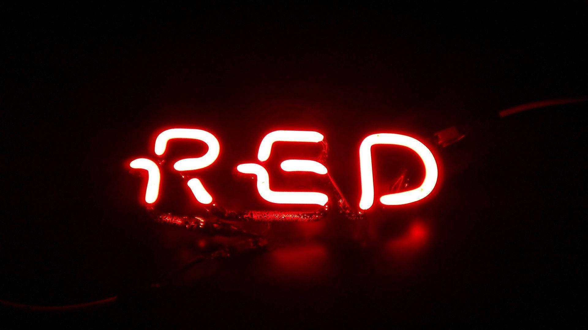 Illuminating Red Aesthetic Neon Text Light Background