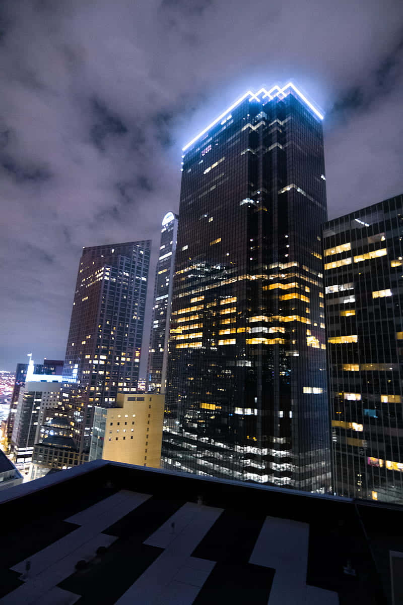 Illuminating The Skyline Of Dallas, Texas Background