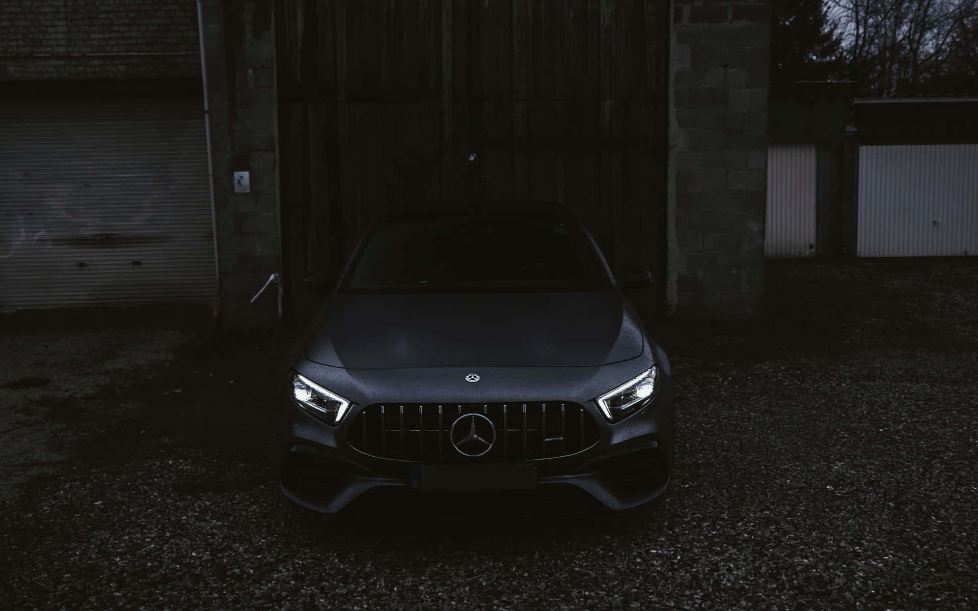 Image A Sleek And Sophisticated Black Mercedes Car Shining In The Sun