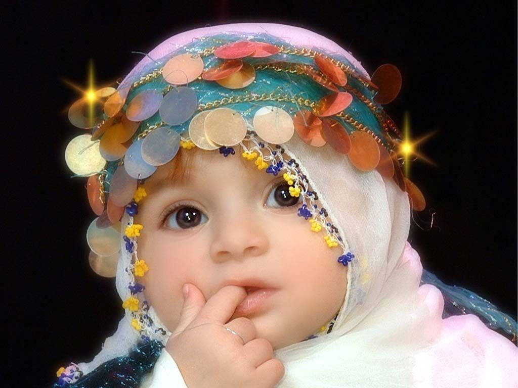 Image A Young Arab Baby Girl With Lush Hair And A Bow Headband