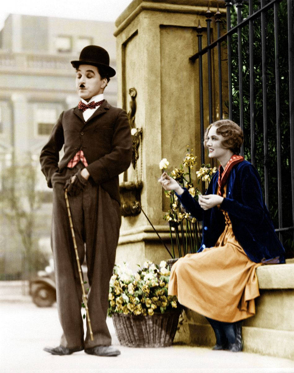 Image Charlie Chaplin Spending Time With His Beautiful Date Background