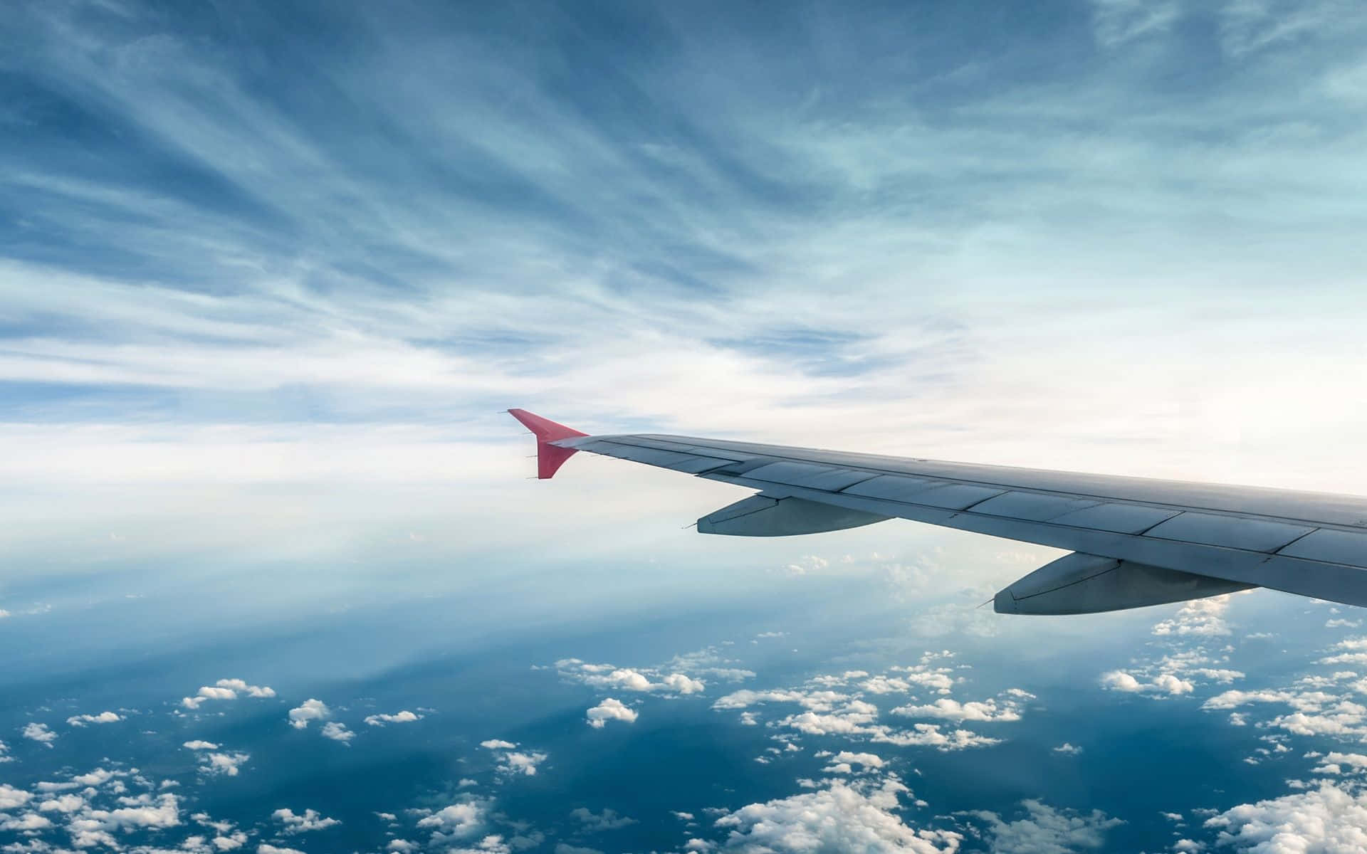 Image Jet Taking Off Against A Crimson Sky Background