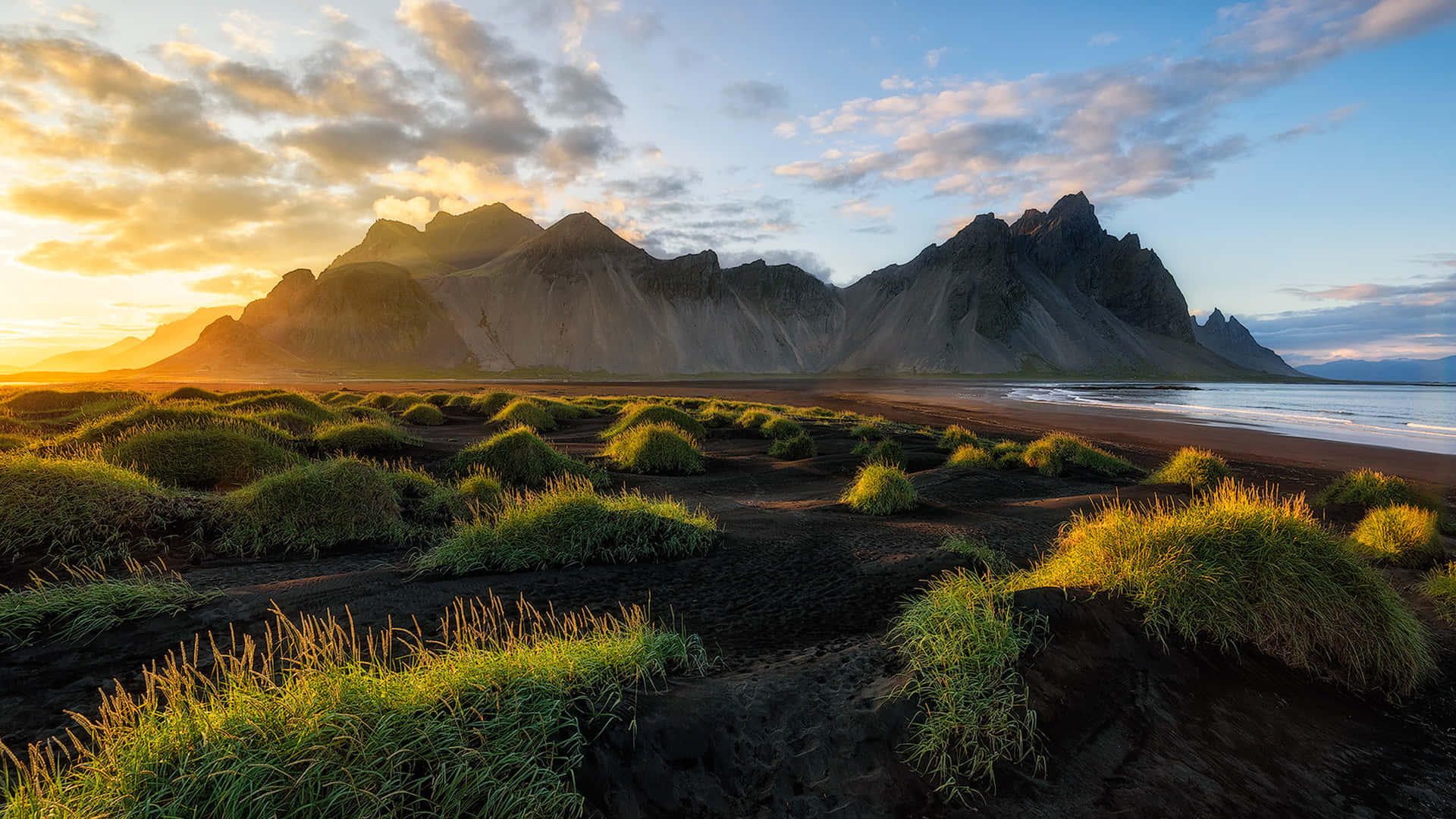 Image Majestic Golden Mountains Surround A Mesmerizing Sunset Background