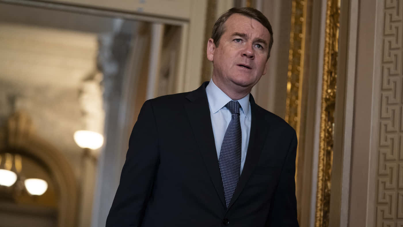 Image Senator Michael Bennet Looking Confident In A Suit Background