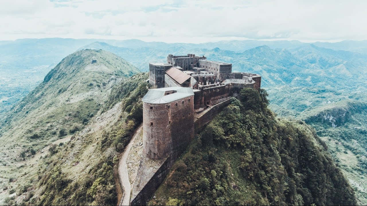 Image The Historic Citadelle Laferriere On The Mountain Ranges Of Haiti Background