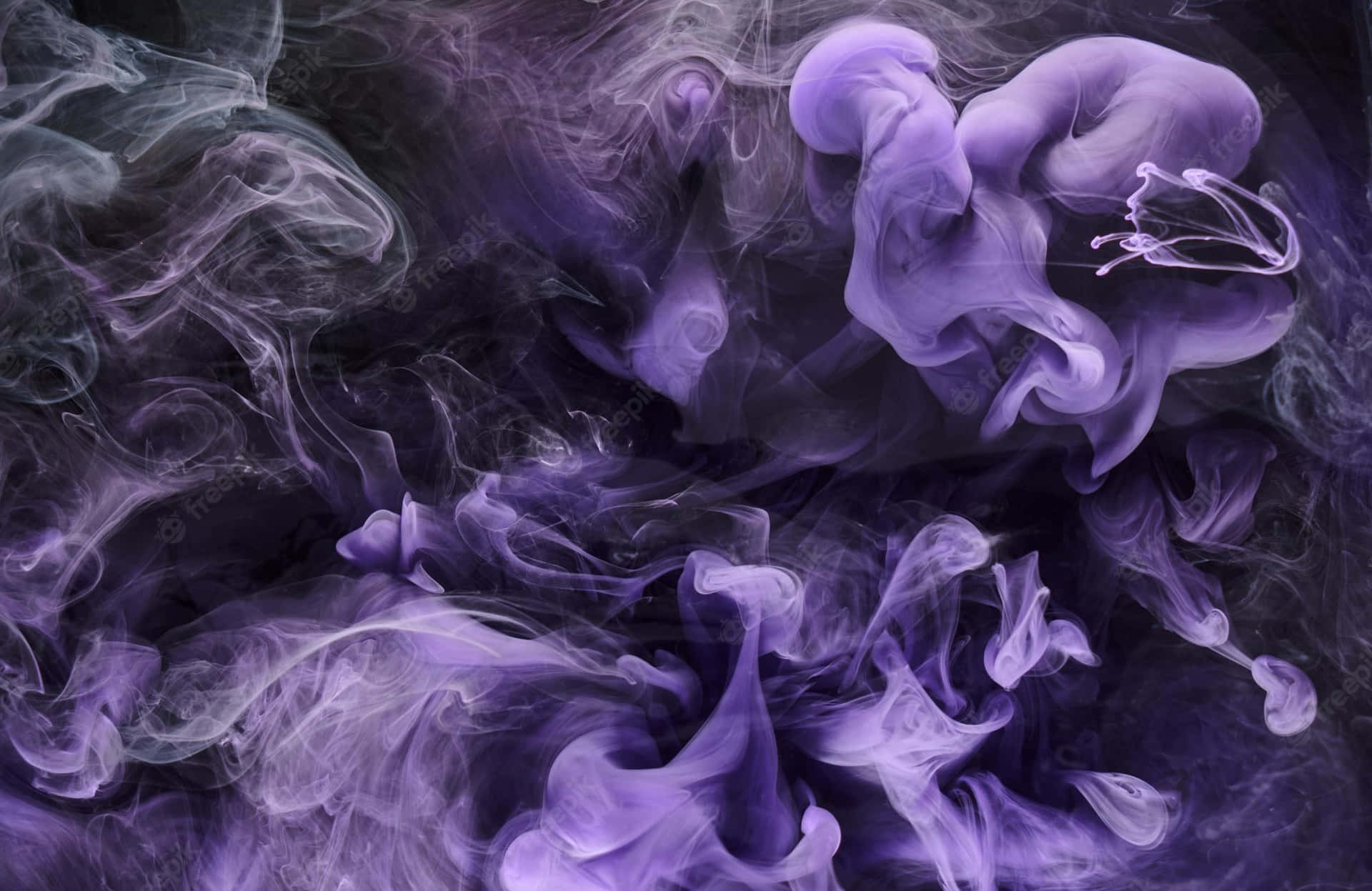 Immersed In A Lush Blue Atmosphere Of Smoke Background