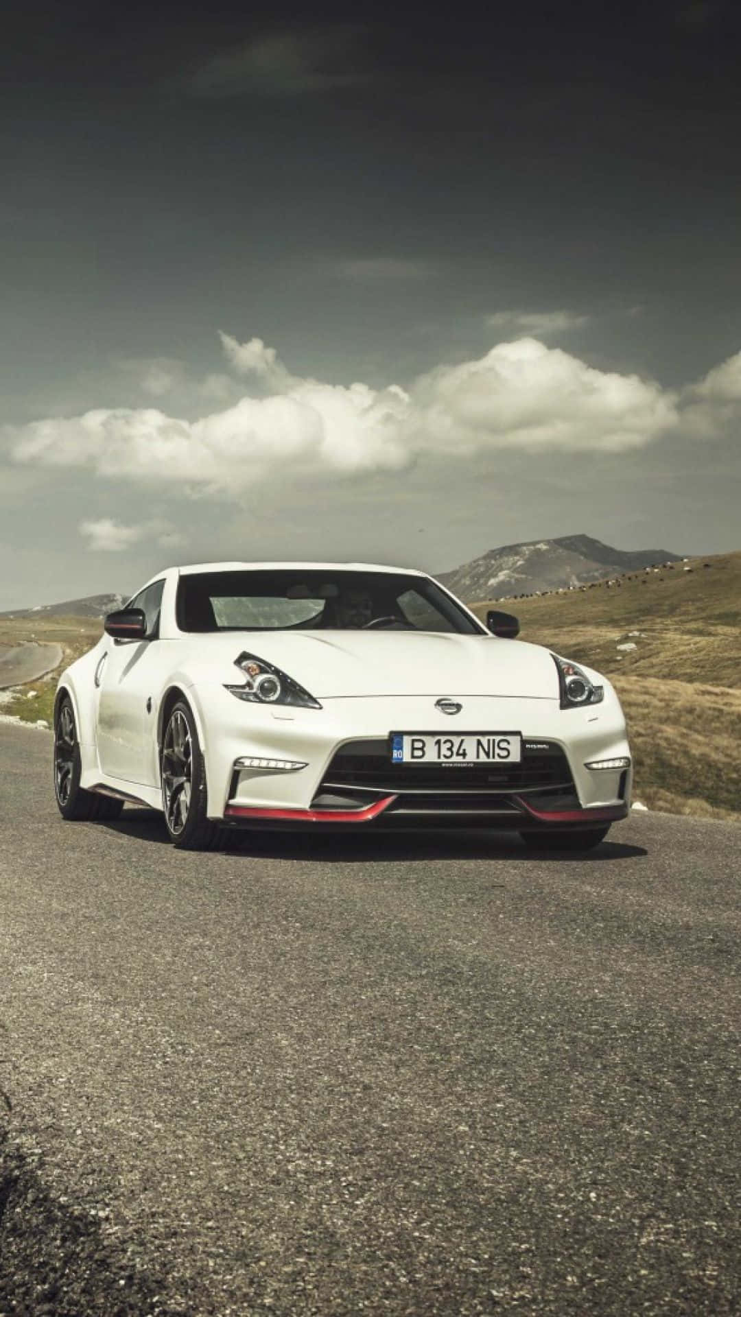 Impress The Crowd With The Nissan 350z Iphone Background