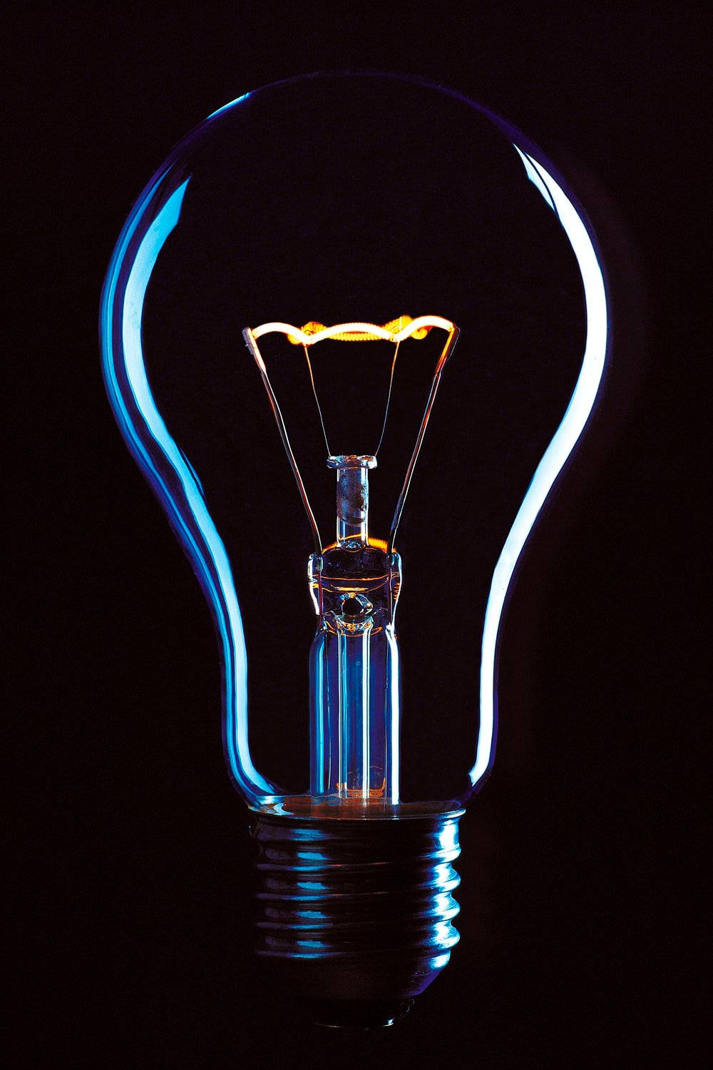 Incandescent Bulb Illuminating Background