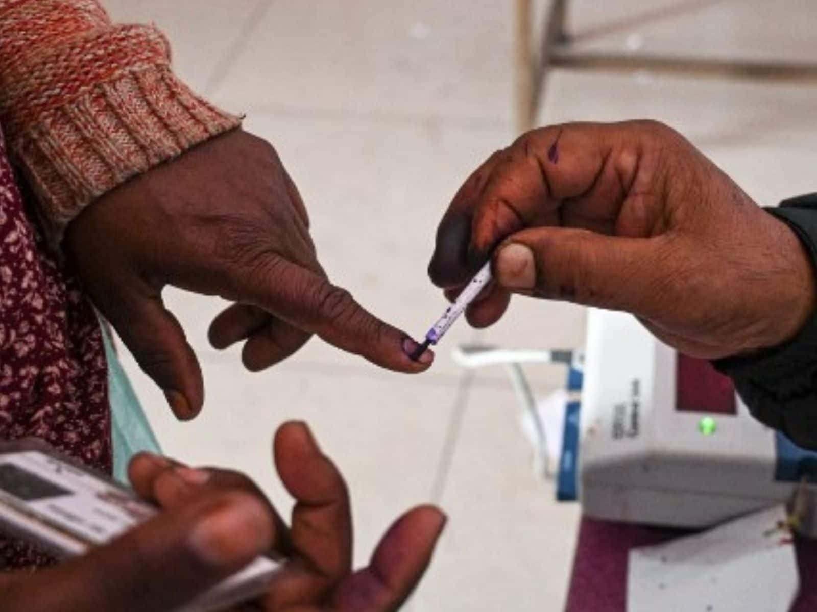 Indelible Ink On Voters Hand Background