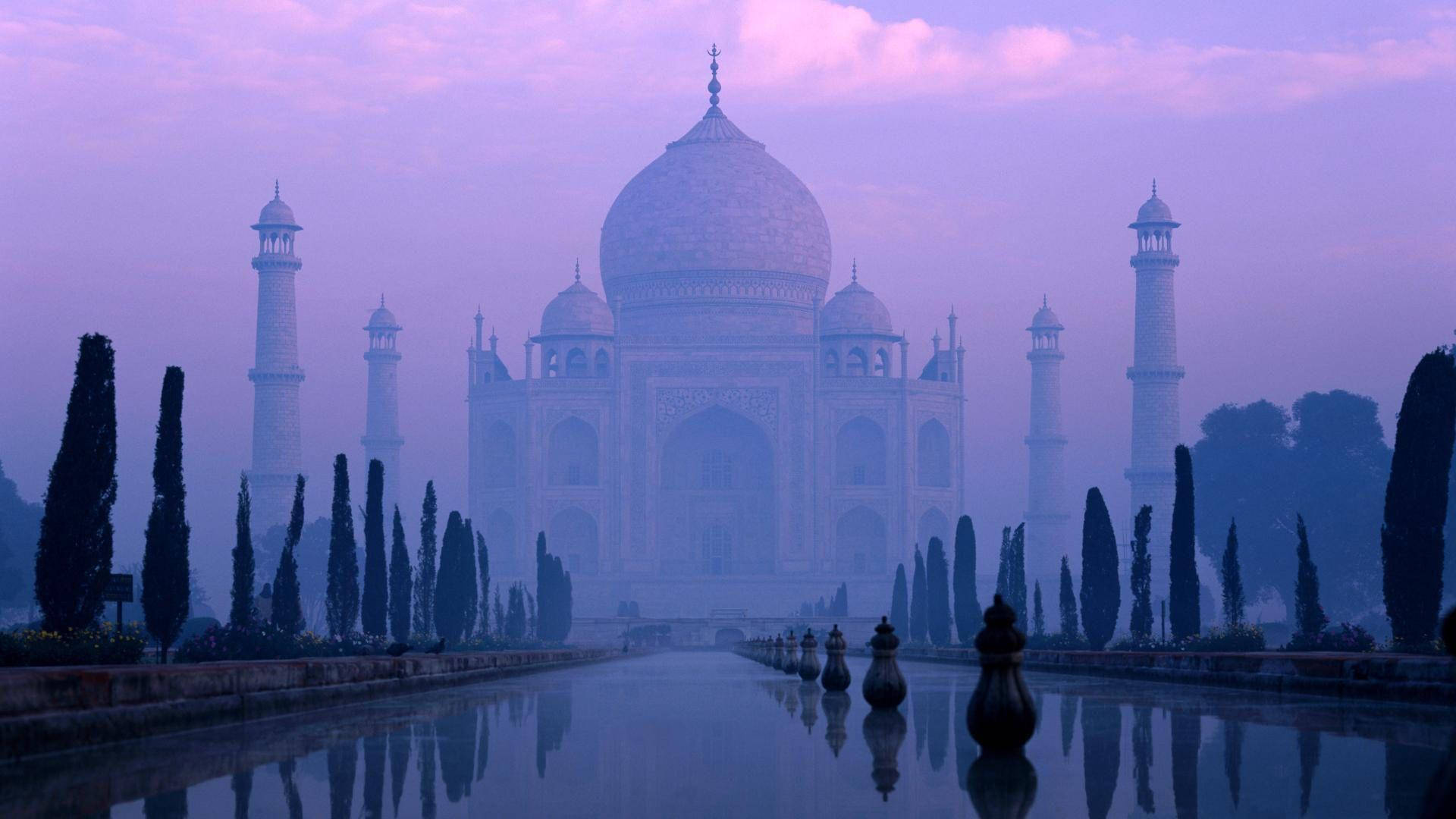 India's Taj Mahal In Mist Background