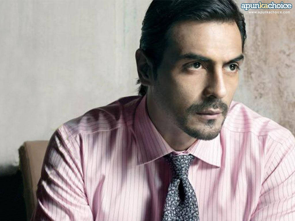 Indian Actor Arjun Rampal Posing For A Photoshoot. Background