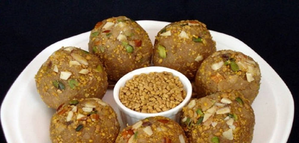 Indian Laddu With Fenugreek Background