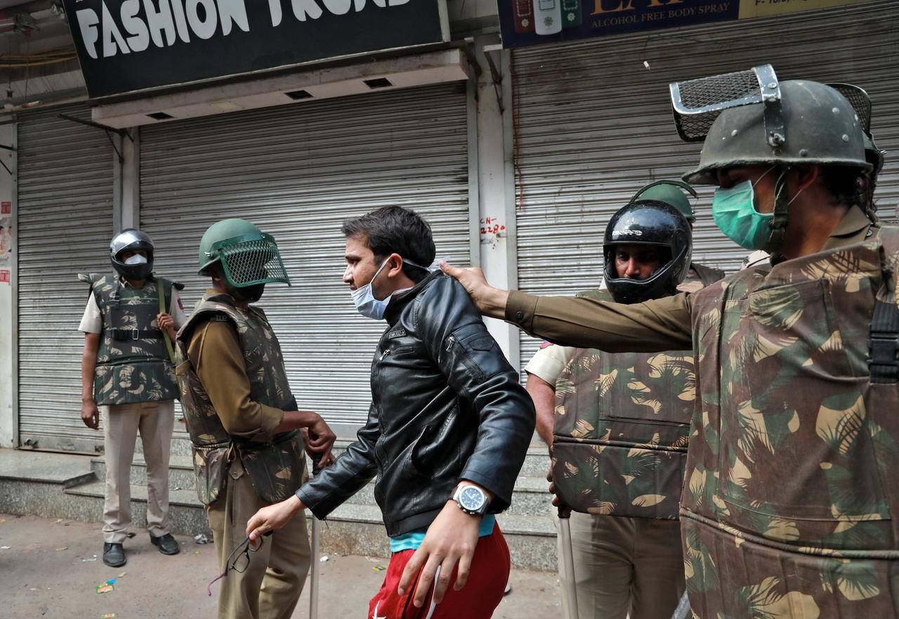 Indian Police Arrest Rioter Background