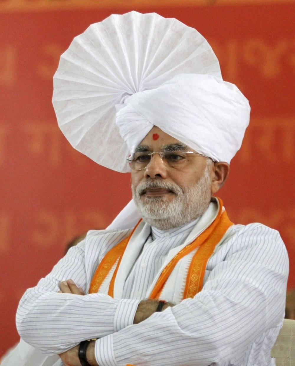 Indian Prime Minister Narendra Modi In White Turban Background