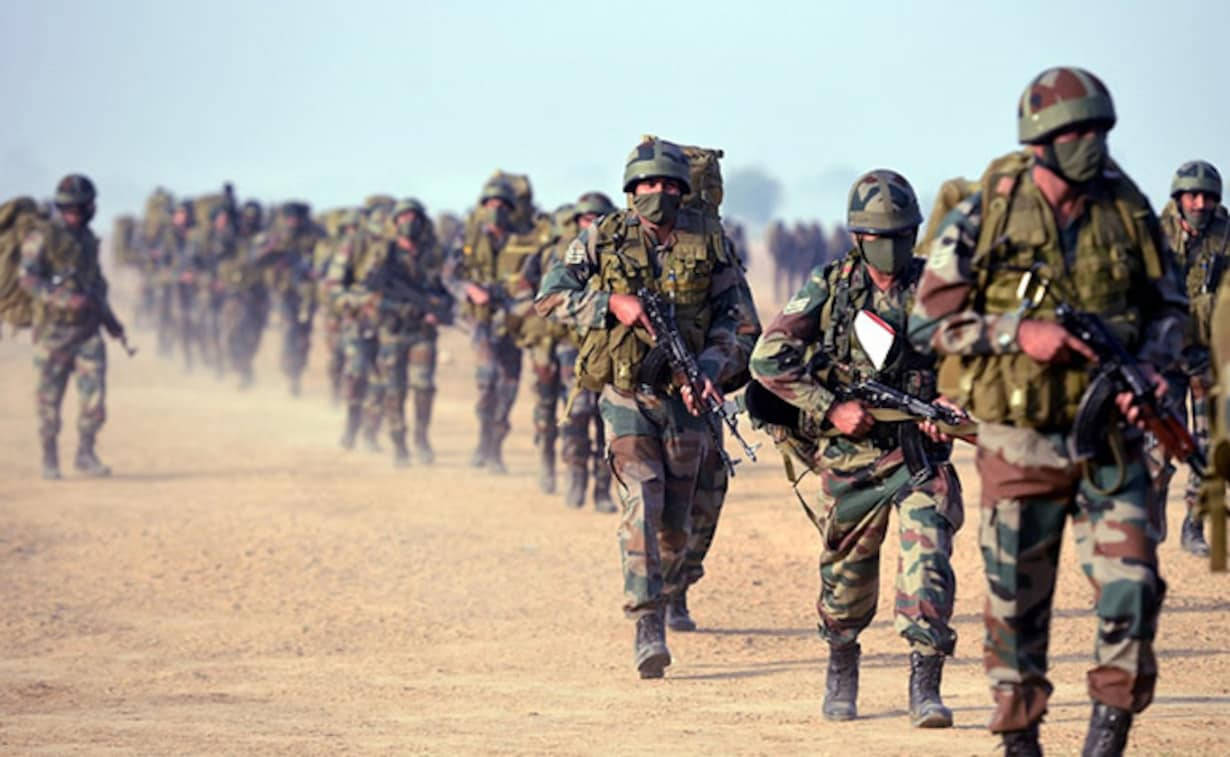 Indian Soldiers On Desert March Background