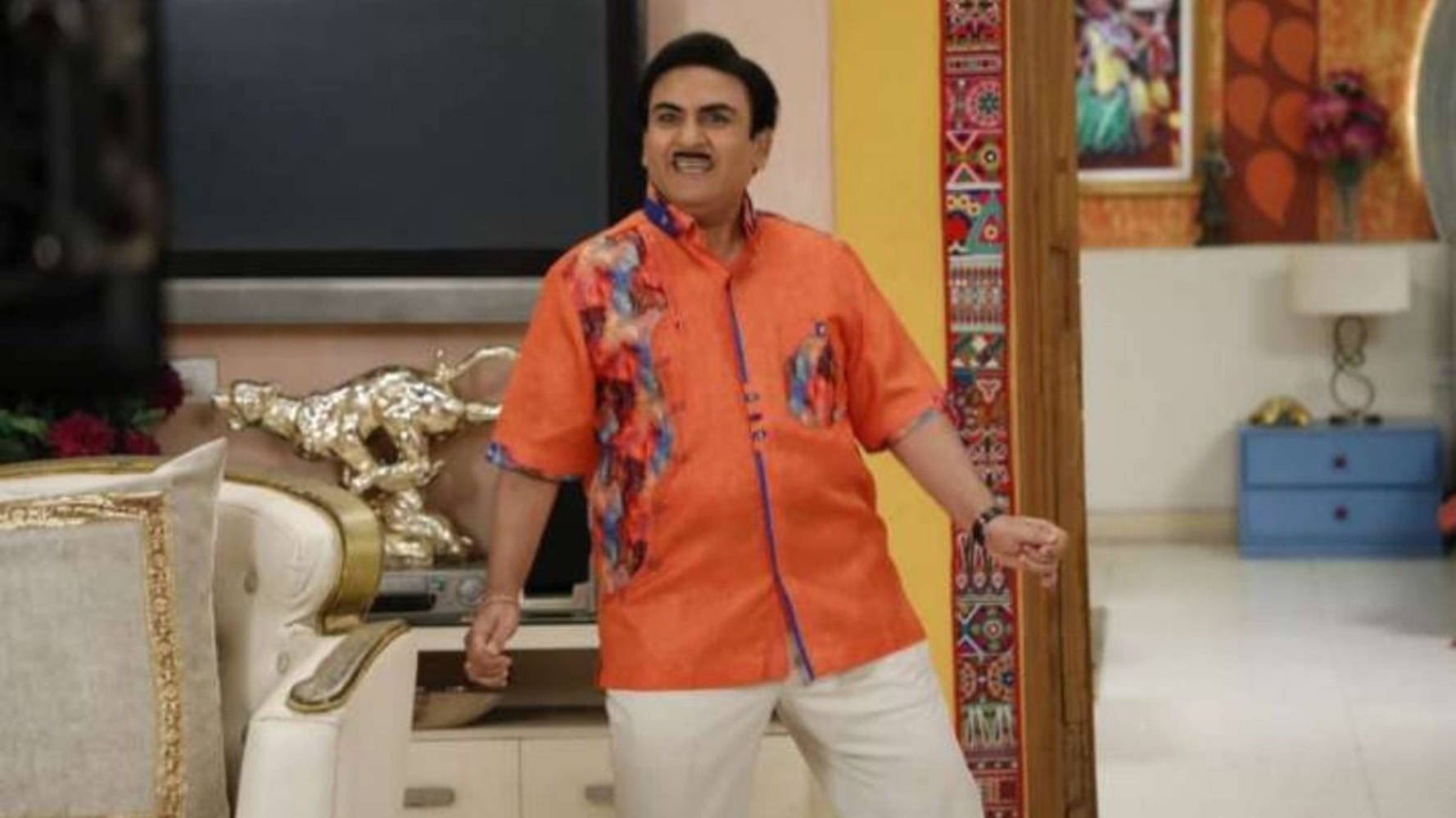 Indian Tv Character Jethalal In Orange Polo